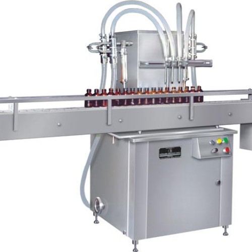 Automatic volumetric liquid bottle filling machine